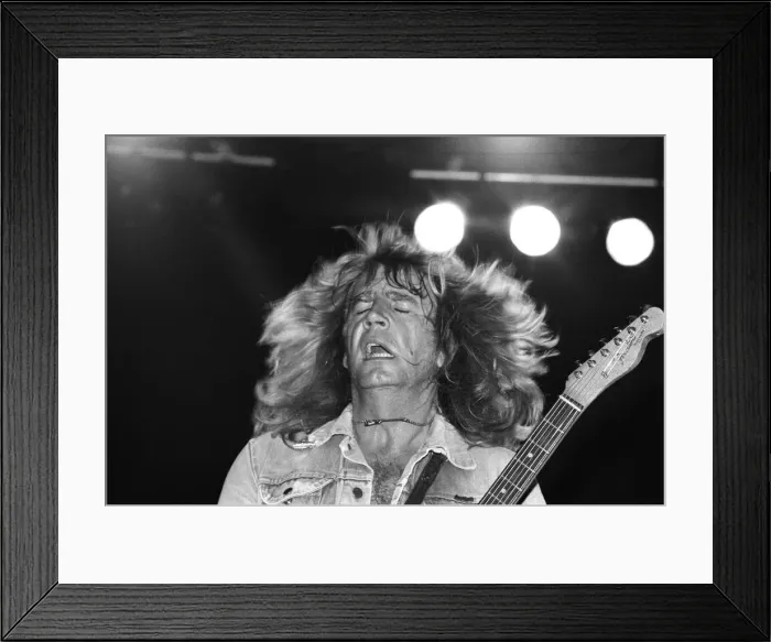 Framed Print : Rick Parfitt of rock group Status Quo, in concert in Vienna, Austria. 8th May 1986 Framed Print : Rick Parfitt of rock group Status Quo, in concert in Vienna, Austria. 8th May 1986