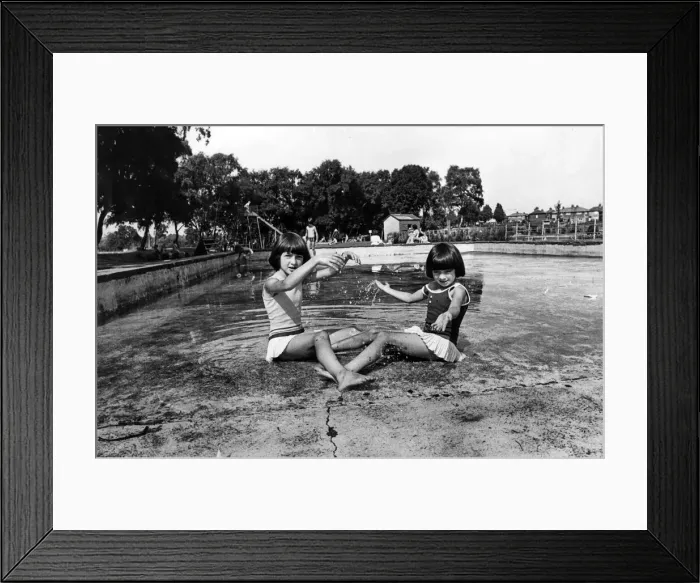 Framed Print : Would-be bathers Maureen, aged 10, and six-year-old Kathleen Armstrong