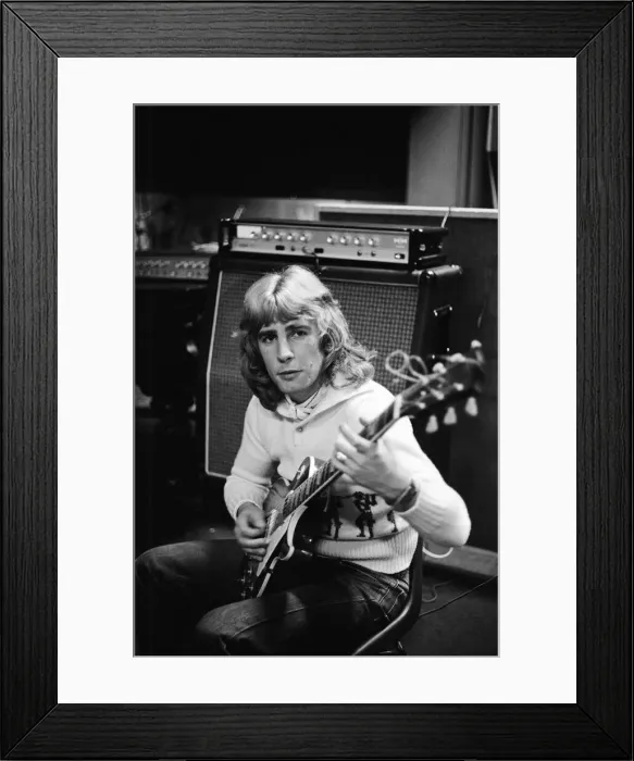 Framed Print : Rick Parfitt, lead guitar in the rock group Status Quo, rehearses in the studio Framed Print : Rick Parfitt, lead guitar in the rock group Status Quo, rehearses in the studio
