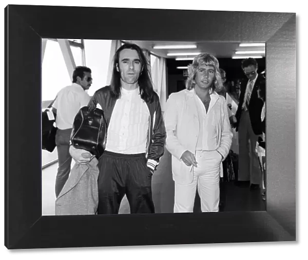 Rick Parfitt (right) and Francis Rossi (left) of the Status Quo pop group arriving at