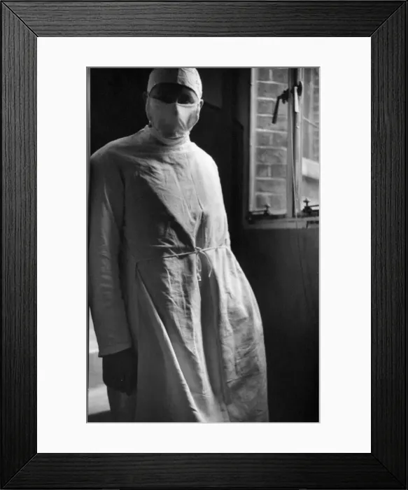 Framed Print : Mirror Cameraman George Greenwell seen here shortly before taking images of a cesarean