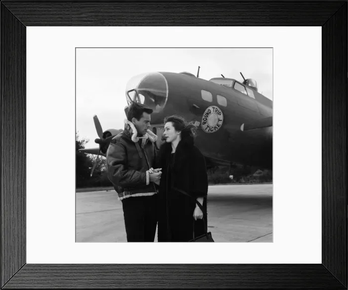 Framed Print : Robert Wagner and Shirley Anne Field filming the War Lover in front of a Boeing B17