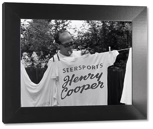 The new European Heavyweight Boxing Champion, Henry Cooper, relaxes at his Wembley home
