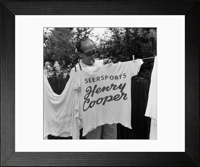 Framed Print : The new European Heavyweight Boxing Champion, Henry Cooper, relaxes at his Wembley home Framed Print : The new European Heavyweight Boxing Champion, Henry Cooper, relaxes at his Wembley home