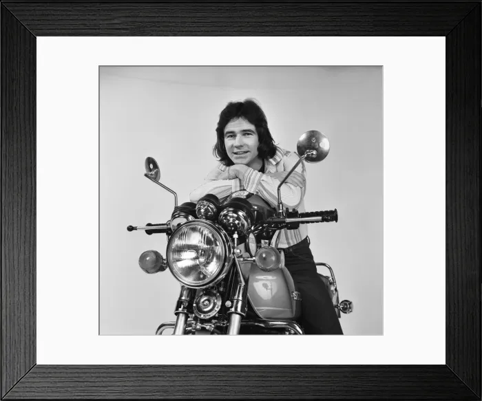 Framed Print : British Motorcycle road racer Barry Sheene poses on a Suzuki GT 750 in the Daily Mirror Framed Print : British Motorcycle road racer Barry Sheene poses on a Suzuki GT 750 in the Daily Mirror