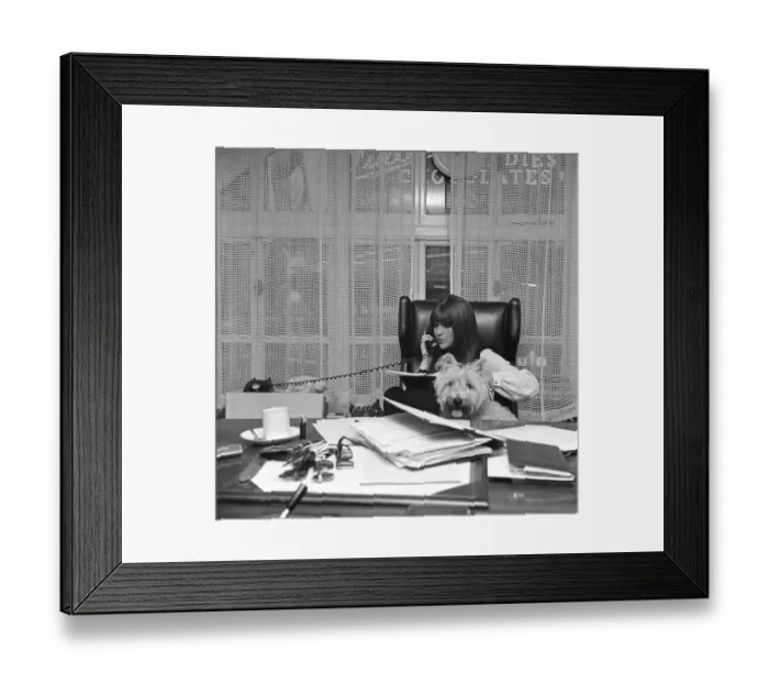 Framed Print : Cathy McGowan, English Television Personality, pictured in her office with her dog