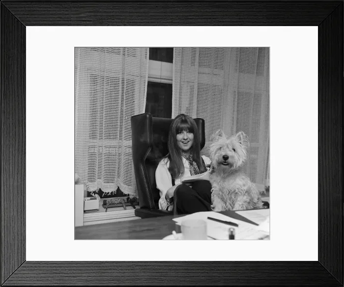 Framed Print : Cathy McGowan, English Television Personality, pictured in her office with her dog Framed Print : Cathy McGowan, English Television Personality, pictured in her office with her dog