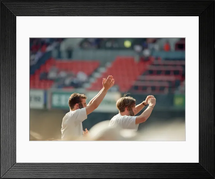 Framed Print : Two Del Amitri fans aloft, and wearing side burns like the Del Amitri lead singer Justin