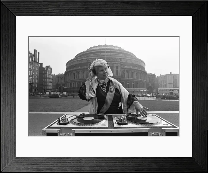 Framed Print : A Queen Victoria lookalike DJ-ing outside the Royal Albert Hall 9th March 1987 Framed Print : A Queen Victoria lookalike DJ-ing outside the Royal Albert Hall 9th March 1987