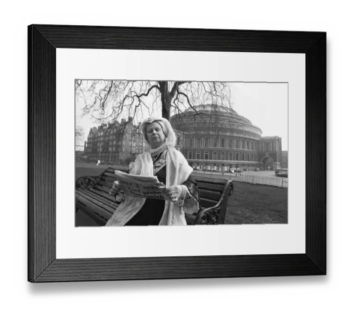 Framed Print : A Queen Victoria lookalike sitting on a park bench in Kensington Gardens close Royal