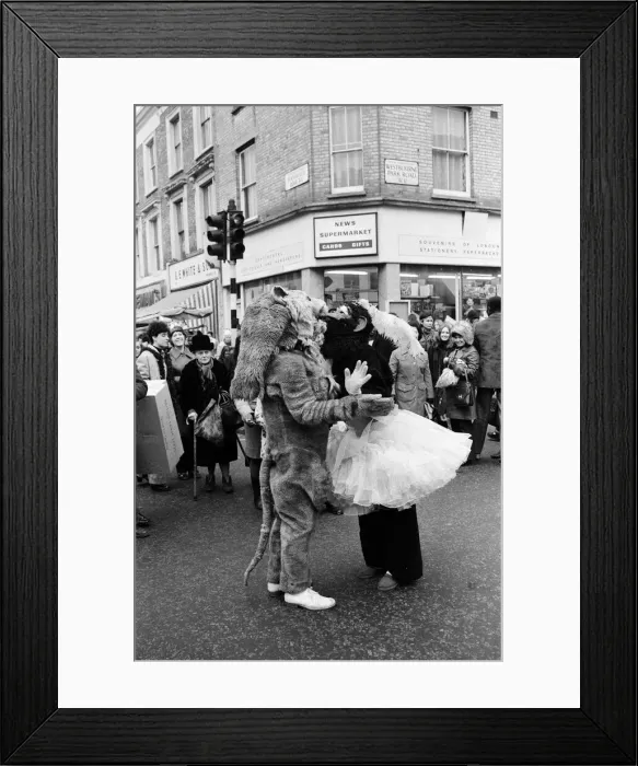 Framed Print : The circus visits Portobello Road, London. 13th January 1973 Framed Print : The circus visits Portobello Road, London. 13th January 1973