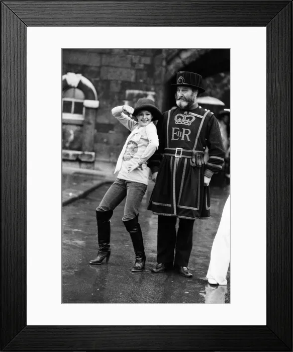 Framed Print : Beefeater Rory Crozier looks on with disbelief as disco dancer Lucia Catti (18 Framed Print : Beefeater Rory Crozier looks on with disbelief as disco dancer Lucia Catti (18
