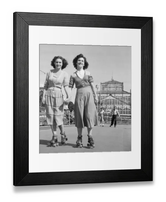 Framed Print : Friends rolling skating in the August sunshine at the Winter Gardens in Great Yarmouth Framed Print : Friends rolling skating in the August sunshine at the Winter Gardens in Great Yarmouth