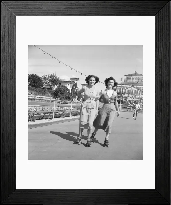 Framed Print : Friends rolling skating in the August sunshine at the Winter Gardens in Great Yarmouth Framed Print : Friends rolling skating in the August sunshine at the Winter Gardens in Great Yarmouth