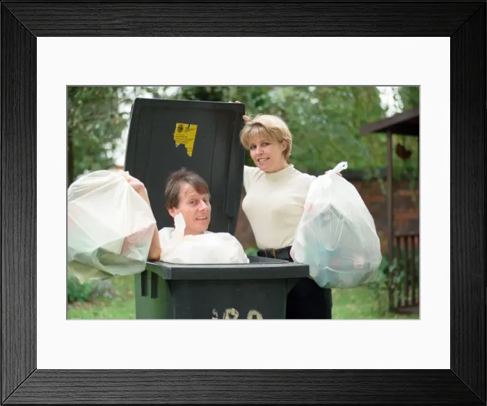 Framed Print : Radio presenters Tony Wadsworth and Julie Mayer are pictured with some rubbish Framed Print : Radio presenters Tony Wadsworth and Julie Mayer are pictured with some rubbish