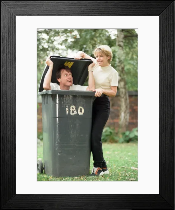 Framed Print : Radio presenters Tony Wadsworth and Julie Mayer are pictured with some rubbish Framed Print : Radio presenters Tony Wadsworth and Julie Mayer are pictured with some rubbish