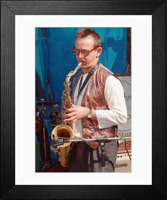 Framed Print : The Brecon Jazz Festival. Brecon, South Wales, A small musical group perform