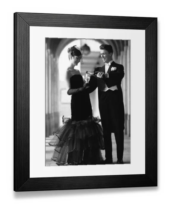 Framed Print : Two darlings of the deb set offer a toast to fashion as they prepared for a night of Framed Print : Two darlings of the deb set offer a toast to fashion as they prepared for a night of