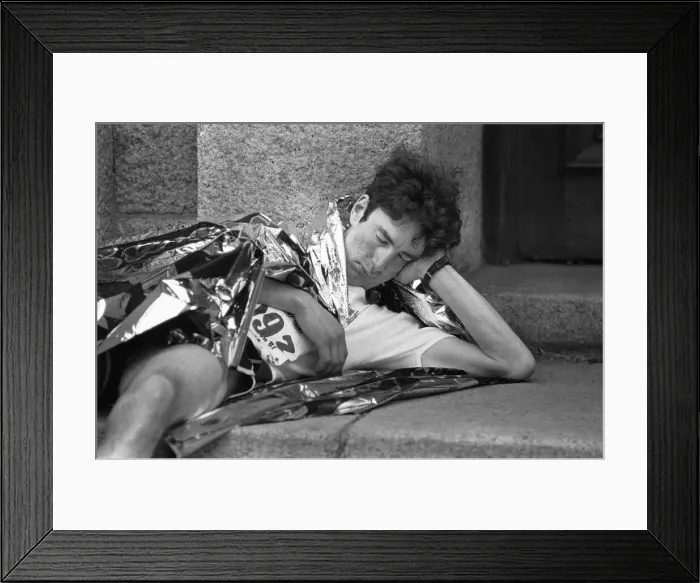 Framed Print : Exhausted marathon runner tries to get 40 winks after completing the race 10th May 1987 Framed Print : Exhausted marathon runner tries to get 40 winks after completing the race 10th May 1987