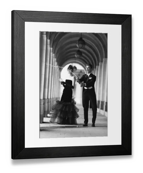 Framed Print : Two darlings of the deb set offer a toast to fashion as they prepared for a night of Framed Print : Two darlings of the deb set offer a toast to fashion as they prepared for a night of