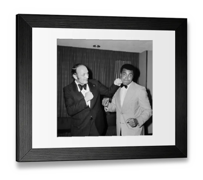 Framed Print : Henry Cooper fooling around with fellow boxer Muhammad Ali at a press conference in Framed Print : Henry Cooper fooling around with fellow boxer Muhammad Ali at a press conference in