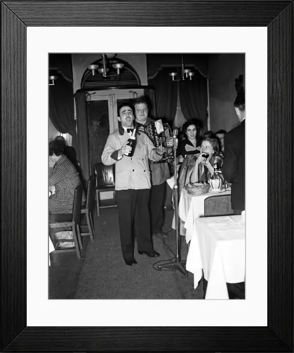 Framed Print : Scenes at Cafe Bleu restaurant in Soho, London. Musicians playing to customers Framed Print : Scenes at Cafe Bleu restaurant in Soho, London. Musicians playing to customers