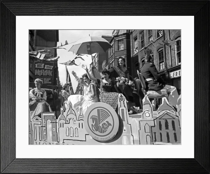 Framed Print : Scenes during the annual Soho Fair in Central London. Miss Soho waving to Framed Print : Scenes during the annual Soho Fair in Central London. Miss Soho waving to