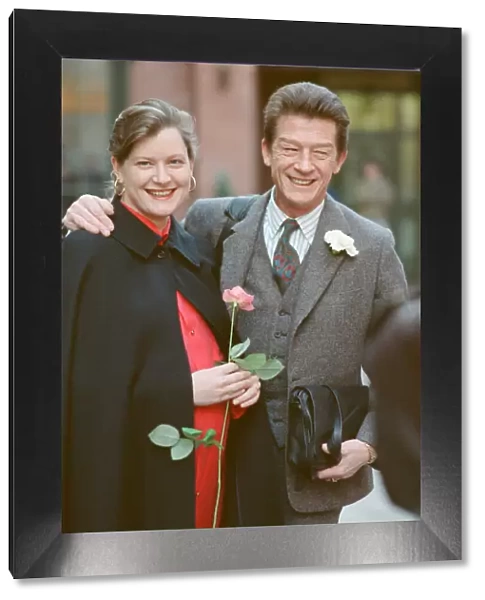 John Hurt marries Jo Dalton at Marylebone Town Hall in London