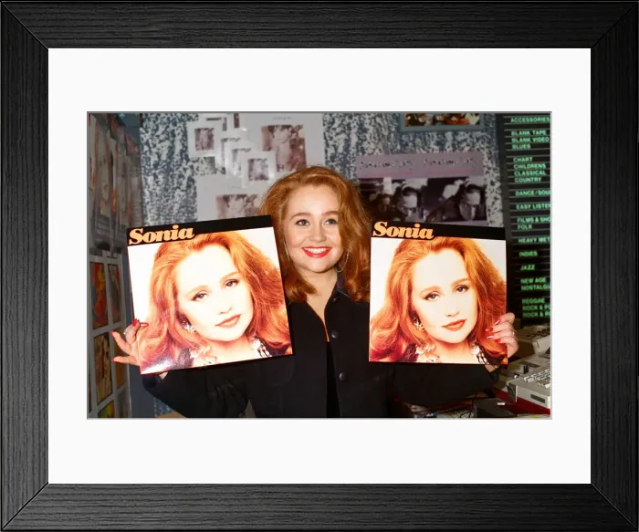 Framed Print : Pop star Sonia signing copies of her album Sonia in Reading. 8th October 1991 Framed Print : Pop star Sonia signing copies of her album Sonia in Reading. 8th October 1991