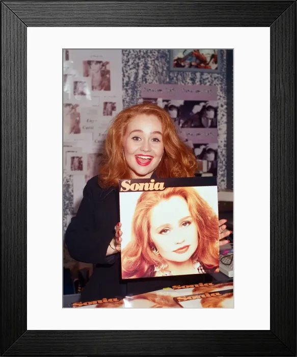 Framed Print : Pop star Sonia signing copies of her album Sonia in Reading. 8th October 1991 Framed Print : Pop star Sonia signing copies of her album Sonia in Reading. 8th October 1991
