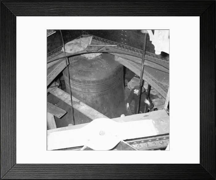 Framed Print : A workmen inspects the bell Big Ben during the major overhaul of all the bells Framed Print : A workmen inspects the bell Big Ben during the major overhaul of all the bells