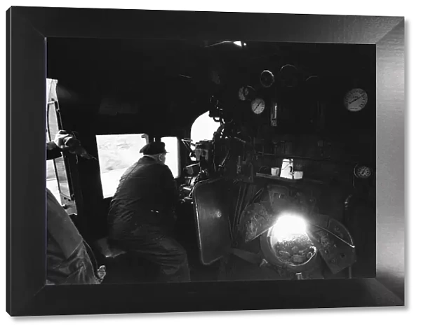 A view from the footplate of locomotive number 34021. A Bulleid Pacific engine of