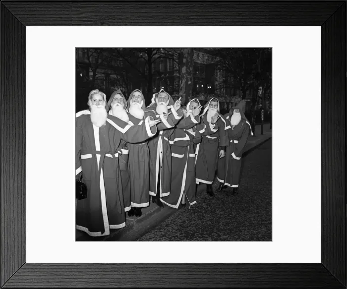Framed Print : Twelve leading show business personalities are to act as Father Christmasses