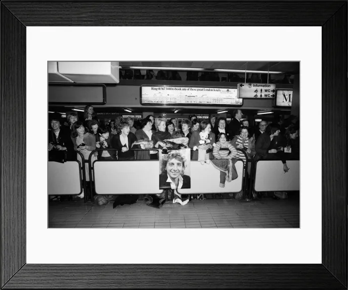 Framed Print : Barry Manilow fans hoping to see him at Heathrow Airport. 7th January 1982 Framed Print : Barry Manilow fans hoping to see him at Heathrow Airport. 7th January 1982