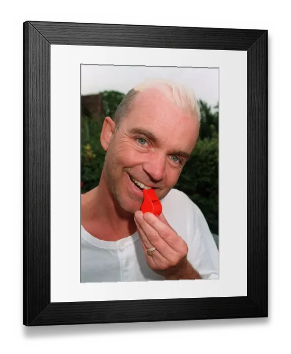 Framed Print : Wayne Dobson TV Magician blows a whistle in the garden of his home Dbase Framed Print : Wayne Dobson TV Magician blows a whistle in the garden of his home Dbase