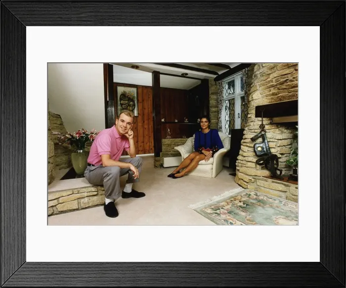 Framed Print : Wayne Dobson Magician with Karen Dobson in cottage living room Dbase A©Mirrorpix