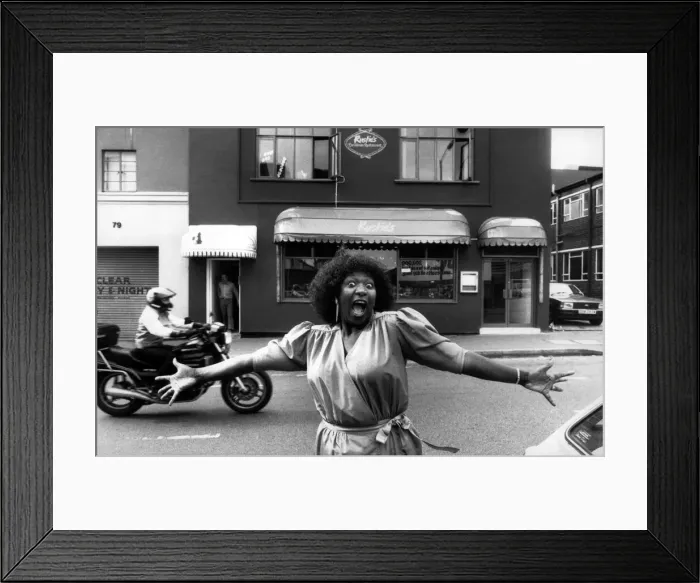 Framed Print : Rustie Lee outside her new restaurant in Hurst Street, Birmingham. 11th October 1985 Framed Print : Rustie Lee outside her new restaurant in Hurst Street, Birmingham. 11th October 1985