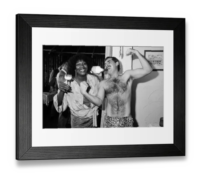Framed Print : Rustie Lee with Tarzan aka Dave Hardman at the opening of her new restaurant in Hurst