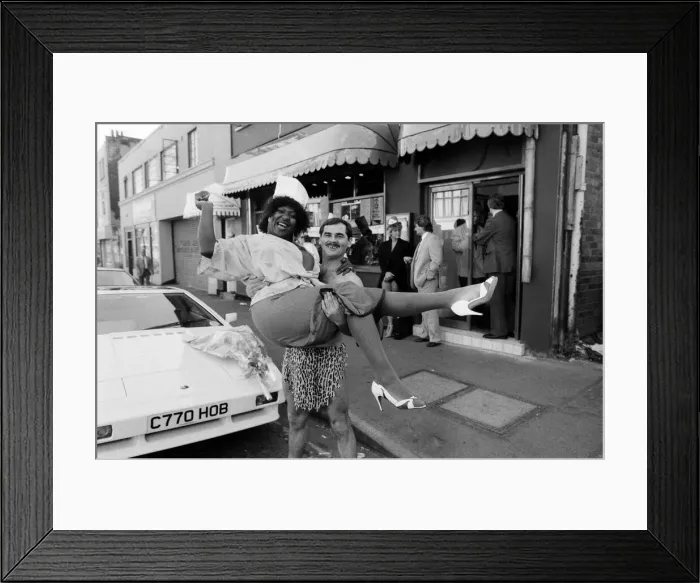 Framed Print : Rustie Lee with Tarzan aka Dave Hardman at the opening of her new restaurant in Hurst Framed Print : Rustie Lee with Tarzan aka Dave Hardman at the opening of her new restaurant in Hurst
