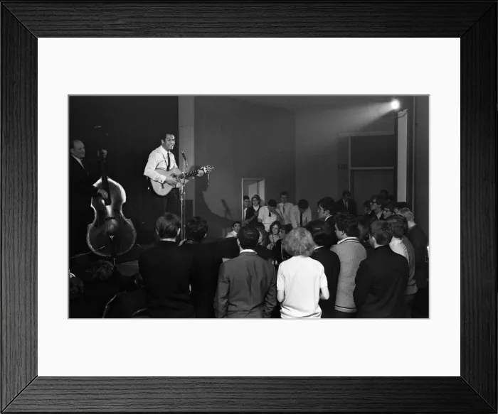 Framed Print : Cy Grant performs at a folk singing club in a Methodist Church, Kings Cross Framed Print : Cy Grant performs at a folk singing club in a Methodist Church, Kings Cross