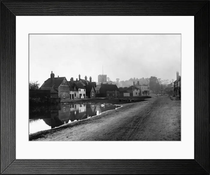 Framed Print : Children sit on the village green Chalfont St. Giles watching the swan on the pond Circa Framed Print : Children sit on the village green Chalfont St. Giles watching the swan on the pond Circa