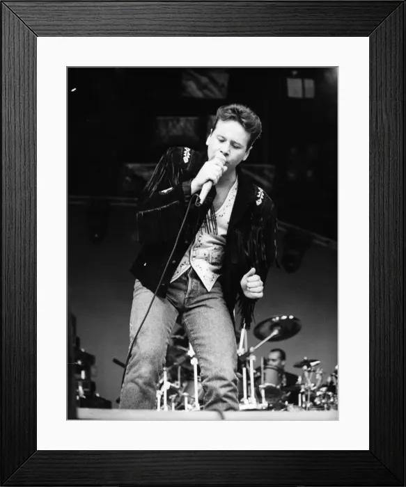 Framed Print : Jim Kerr, lead singer of the rock group Simple Minds entertains the crowd at the groups Framed Print : Jim Kerr, lead singer of the rock group Simple Minds entertains the crowd at the groups