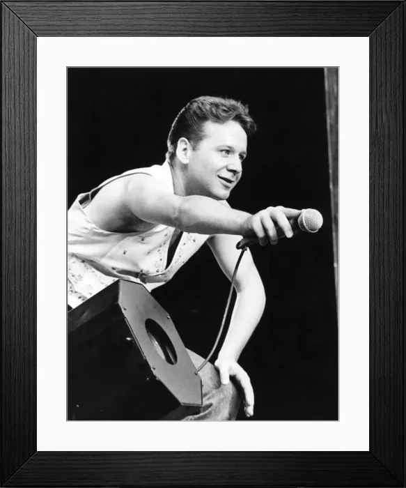 Framed Print : Charlie Burchill, guitarist with the rock group Simple Minds entertains the crowd Framed Print : Charlie Burchill, guitarist with the rock group Simple Minds entertains the crowd