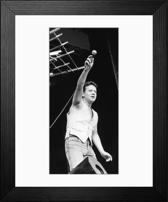 Framed Print : Jim Kerr, lead singer of the rock group Simple Minds entertains the crowd at the groups Framed Print : Jim Kerr, lead singer of the rock group Simple Minds entertains the crowd at the groups