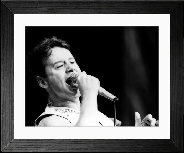 Framed Print : Jim Kerr, lead singer of the rock group Simple Minds entertains the crowd at the groups Framed Print : Jim Kerr, lead singer of the rock group Simple Minds entertains the crowd at the groups