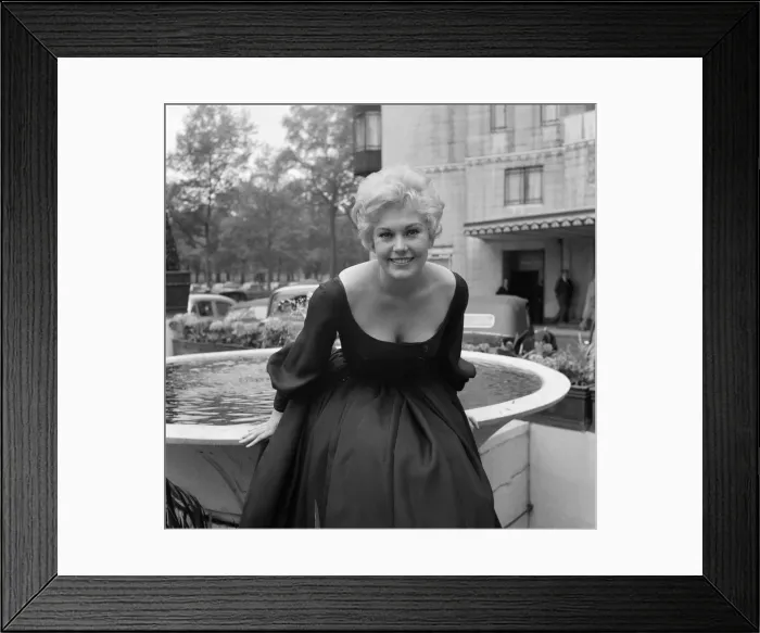 Framed Print : Actress Kim Novak at The Dorchester Hotel. 25th May 1956