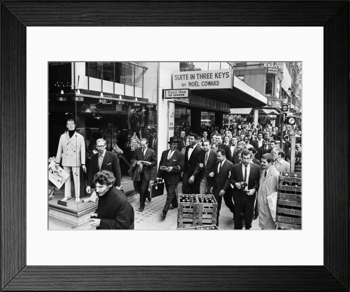 Framed Print : Cassius Clay (centre) and entourage on route to his press conference for his upcoming Framed Print : Cassius Clay (centre) and entourage on route to his press conference for his upcoming