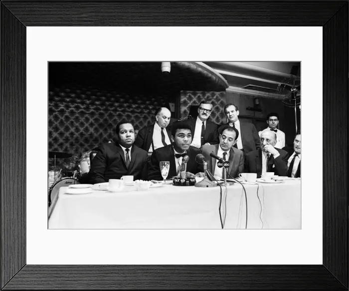 Framed Print : Cassius Clay (centre) holding a press conference prior to his rematch with Henry Cooper