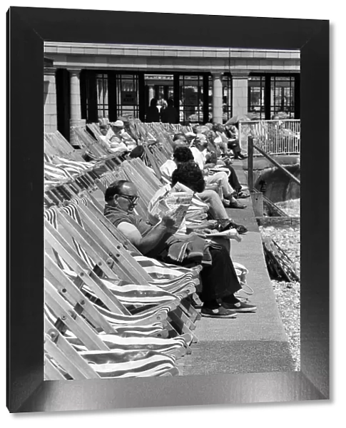 Holidaymakers enjoying themselves at Eastbourne, East Sussex, during the summer of 1976