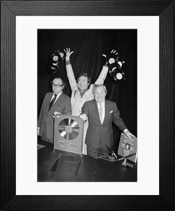 Framed Print : Morecambe and Wise present Des O Connor with a golden disc to mark 100000 sales of Framed Print : Morecambe and Wise present Des O Connor with a golden disc to mark 100000 sales of